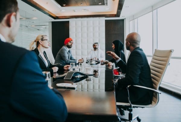 Mixed business team making agreements on future business plans. in the office